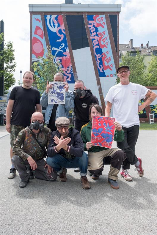 30 Jahre Städtepartnerschaft: Internationale Künstler aus Düsseldorf, Chemnitz, Haifa und Reading kreieren gemeinsam ein Wandbild an der Münsterstraße